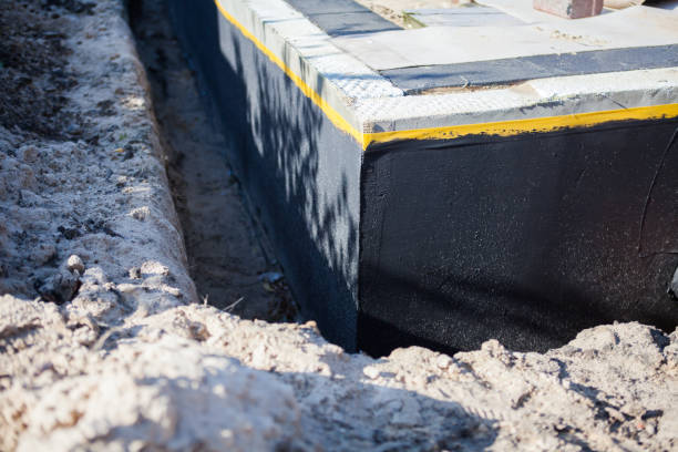 Professional Interior Drainage System technician working in Old Fort, OH